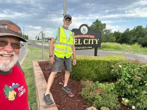 Volunteers at Reno Entrance Sign